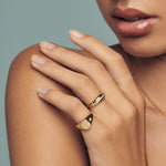 domed gold ring with crystals