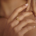 tiny gold ring with olive green stone