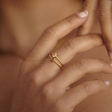 tiny gold ring with olive green stone